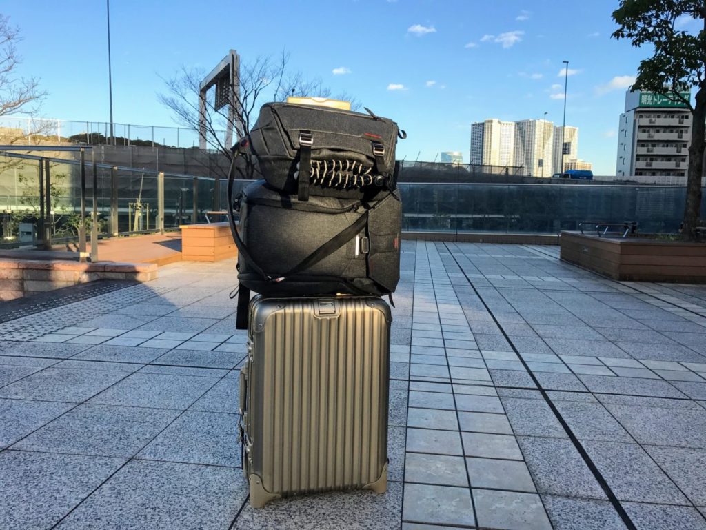 everyday backpack sling docked with rimowa topas front